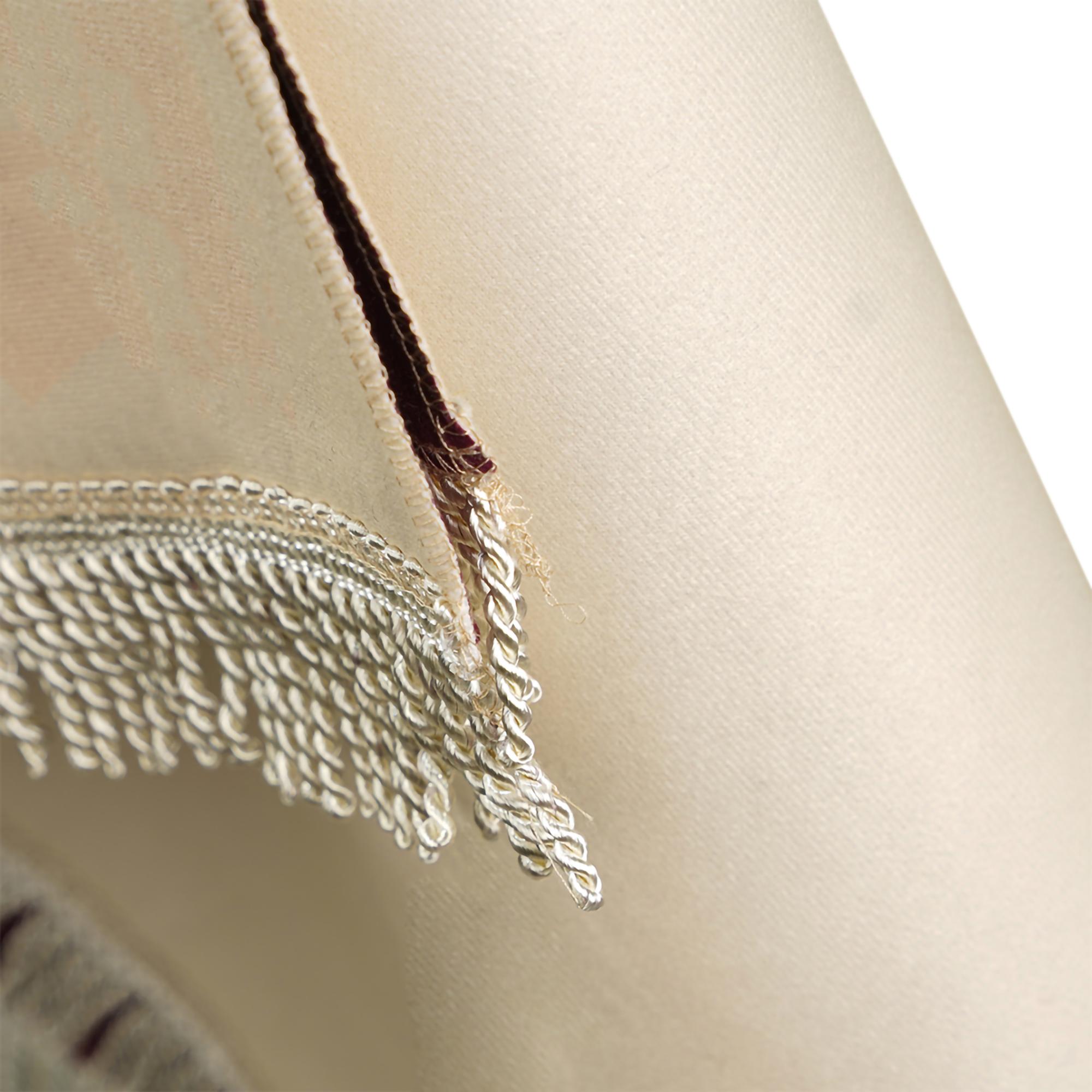 detailed satin stitch on linen fabric
